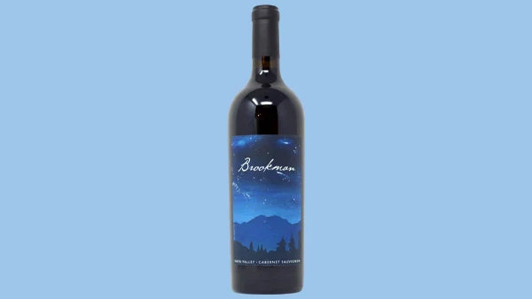 Bottle of Brookman Napa Valley Cabernet Sauvignon, label with a starry night sky over mountains