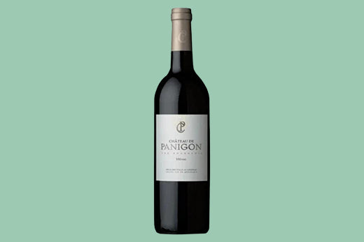 Bottle of 2016 Chateau de Panigon Medoc, white label with a scripted C monogram