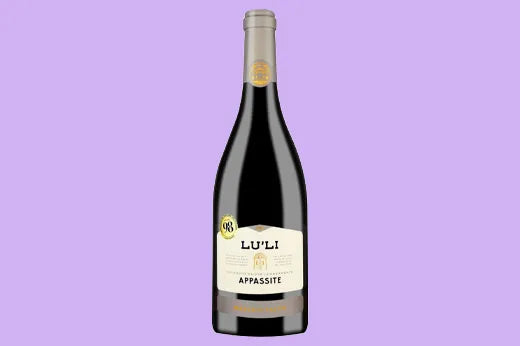 Bottle of 2019 Masca del Tacco Lu'Li Appassite, cream label reading LU'LI APPASSITE, purple background