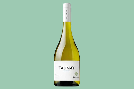 Bottle of 2019 Tabali Talinay Chardonnay, pale gold wine, white label with a green Tabali square