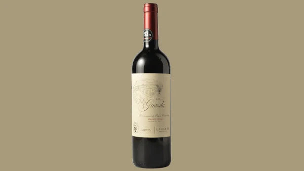 Bottle of Mendoza red wine, cream label with a script name and an estate line drawing