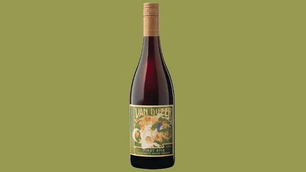 Bottle of Van Duzer Pinot Noir with a colorful art nouveau label, on an olive green background