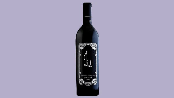Bottle of Napa Valley Cabernet Sauvignon with an ornate black and silver filigree label