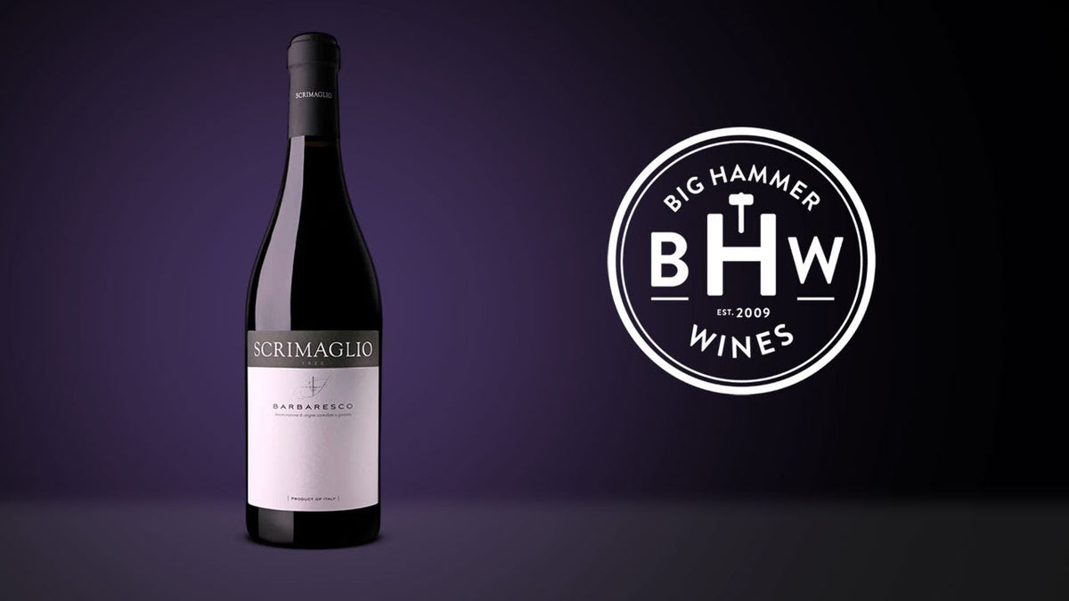 Bottle of Scrimaglio Barbaresco beside the Big Hammer Wines logo
