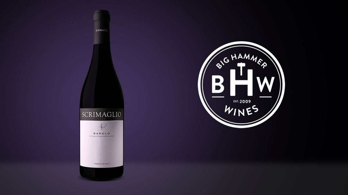 Bottle of Scrimaglio Barolo beside the Big Hammer Wines logo