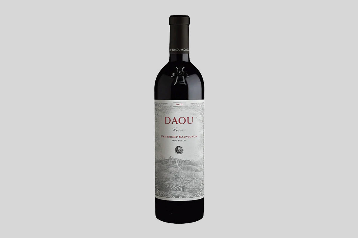 Bottle of 2019 Daou Reserve Cabernet Sauvignon, Paso Robles, silver label with an engraved landscape