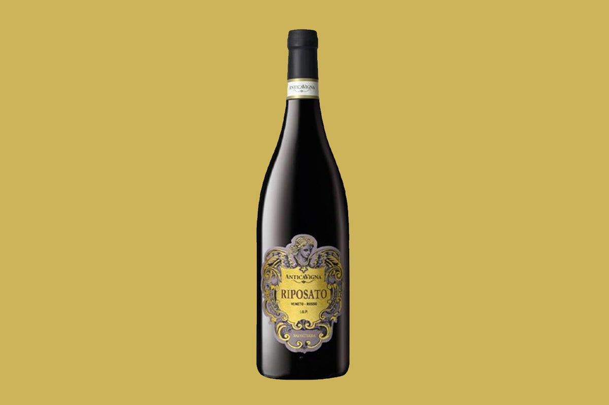 Bottle of 2018 SalvaTerra Riposato Veneto Rosso with an ornate gold scrollwork label