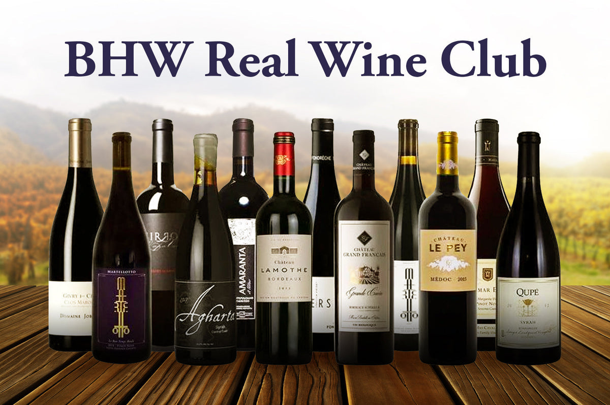 Graphic reading "BHW Real Wine Club" above a row of twelve wine bottles on a vineyard background