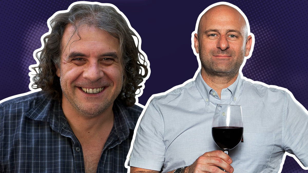 Marcelo Pelleriti smiling beside Greg Martellotto, who holds a glass of red wine