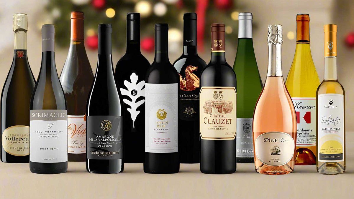 Twelve wine bottles including sparkling, red, rose and dessert wines against a dark holiday backdrop