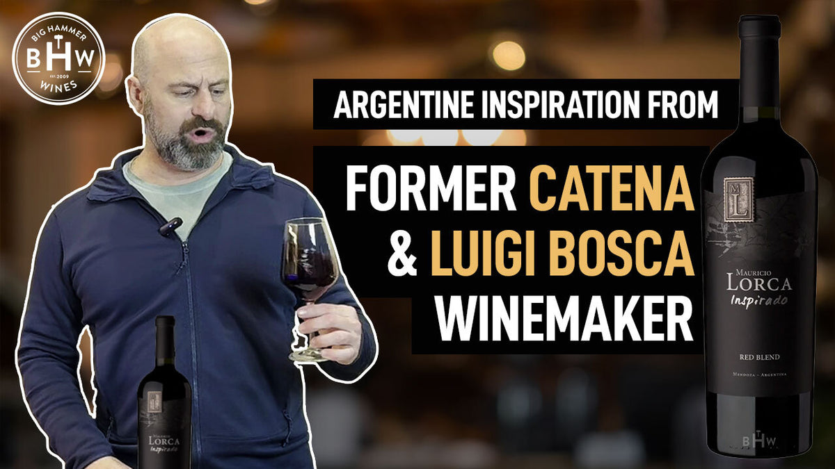 Man holding a glass of red wine beside bottles of Lorca red blend, text about an Argentine winemaker