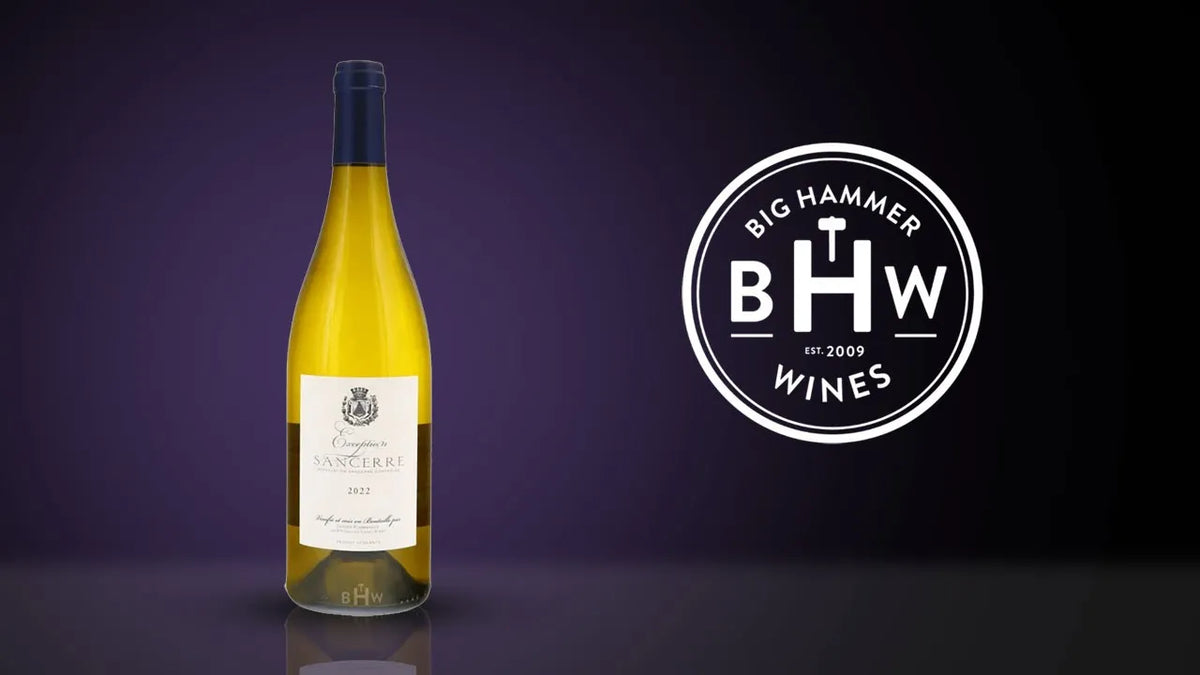 Bottle of white wine with a cream label beside the Big Hammer Wines logo on a purple background
