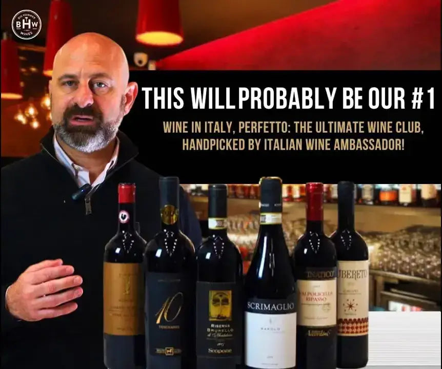 Man behind six Italian red wine bottles with text "This will probably be our #1"