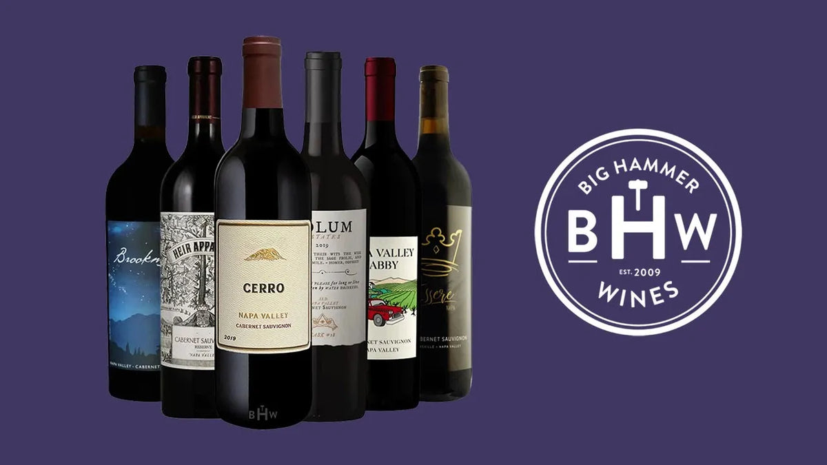Six bottles of Napa Valley Cabernet Sauvignon beside the Big Hammer Wines logo