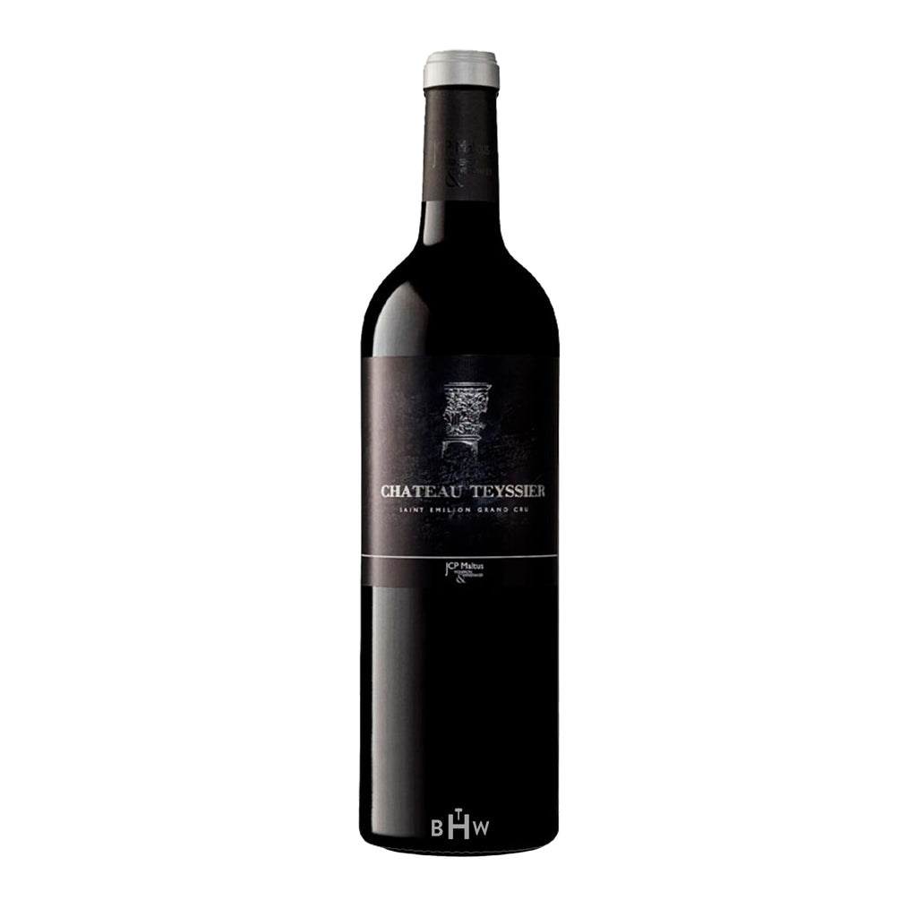 Wine bottle with 'Chateau Teysseier' label on a white background