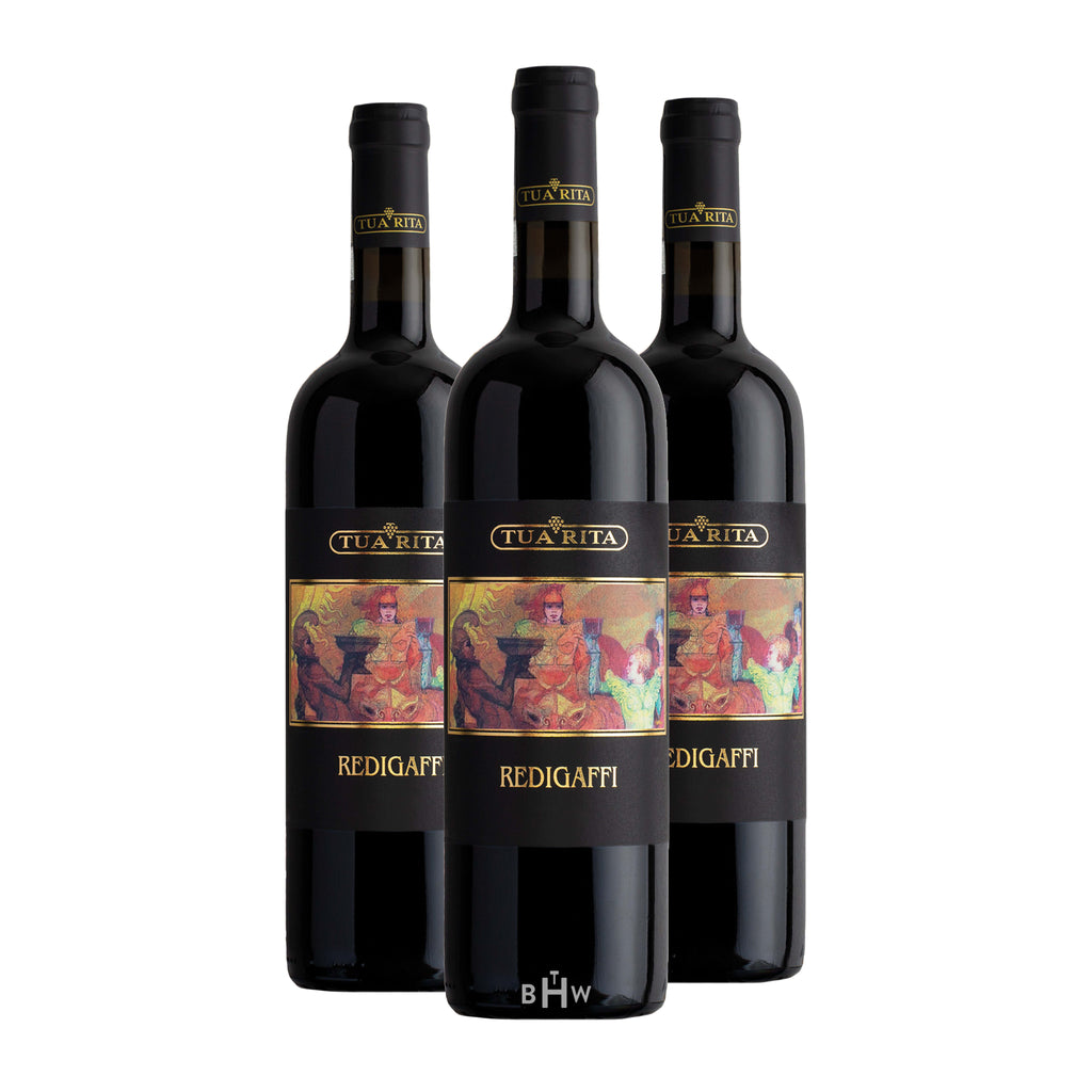 Three bottles of Tua Rita Redigaffi wine on a white background