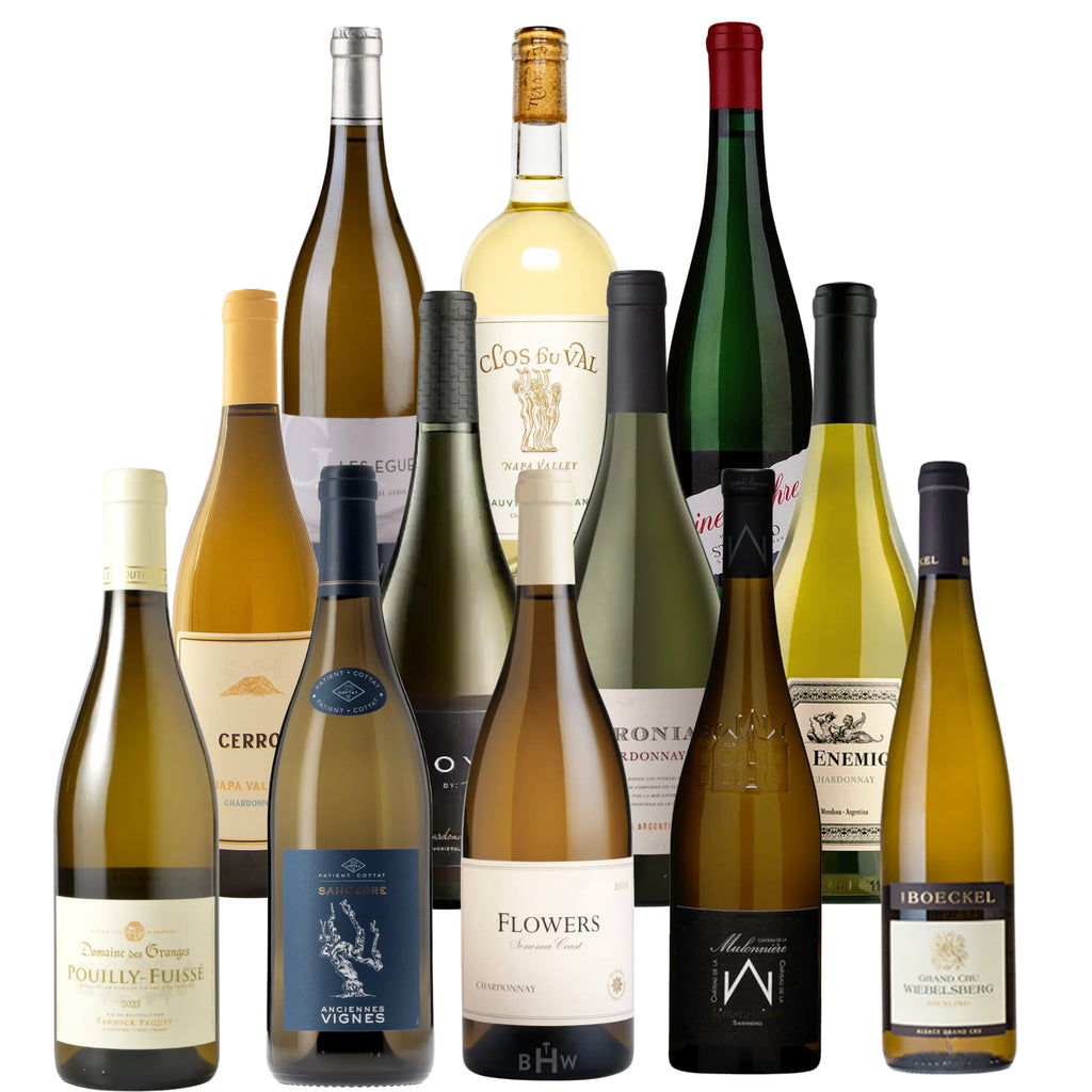 A curated collection of twelve premier white wine bottles arranged in a tiered display, featuring Flowers Chardonnay, Patient Cottat Sancerre Vieilles Vignes, Domaine des Granges Pouilly-Fuissé, and El Enemigo Chardonnay, curated by Big Hammer Wines.